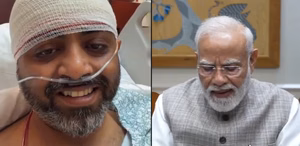 Captain Smit Machchhar speaks from his hospital bed with Prime Minister Narendra Modi during a video call after the flydubai cockpit attack.